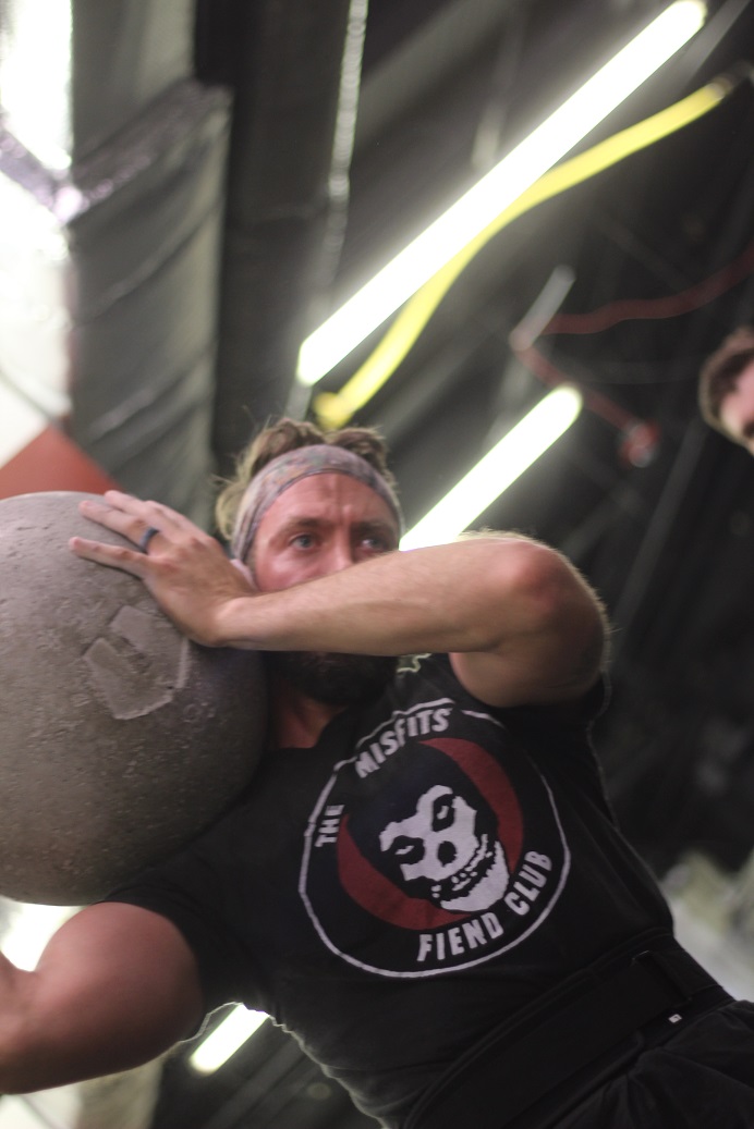 Smith shouldering a big rock!