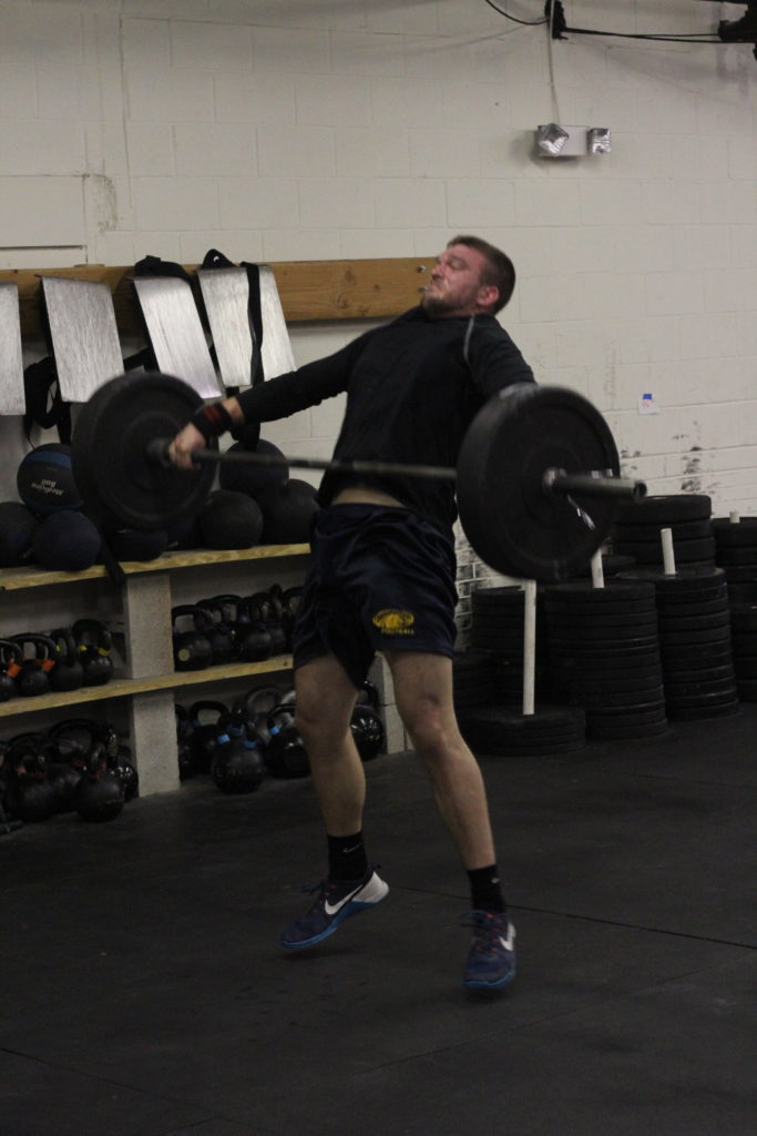 Coach Iggy hitting full extension on a snatch.